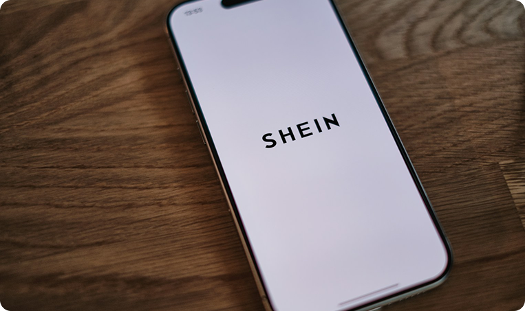 SHEIN logo displayed on a smartphone screen